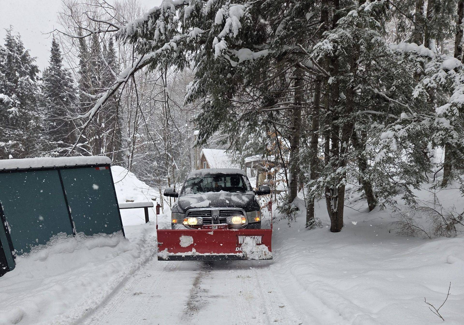 Professional snow removal and snow plowing for a cottage driveway in Haliburton and Bancroft